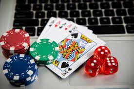 badakbet Casino Hold'em live dealer table with community cards displayed on screen